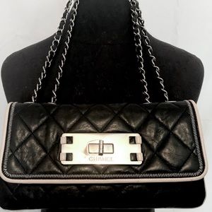 Black CHANEL reissue E/W flap bag